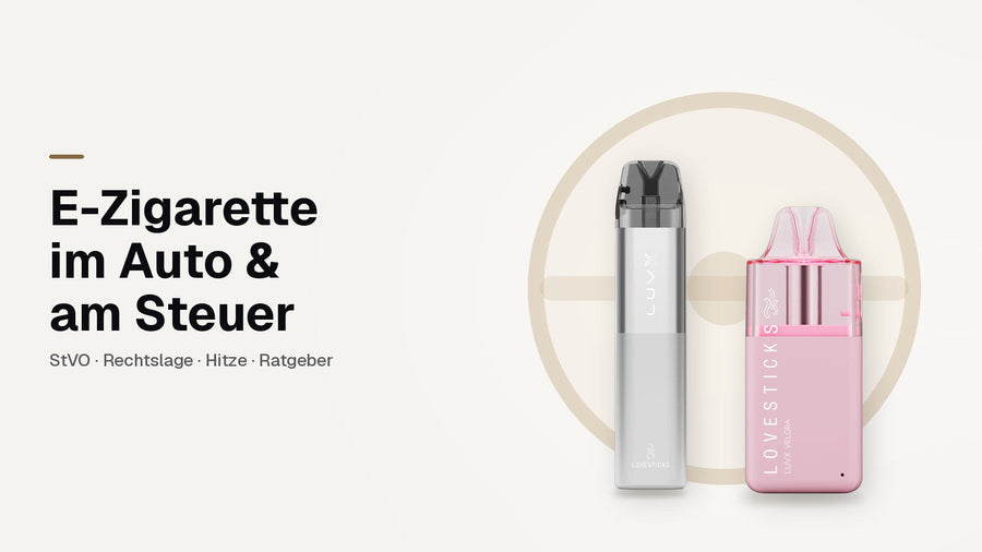 E-Zigarette im Auto: LUVX Velora Pink und LUVX Pod Kit Silver vor stilisiertem Lenkrad